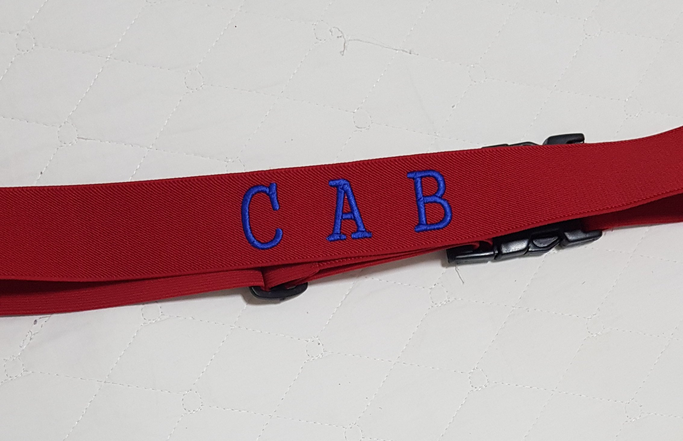 Faixa elástica para mala personalizada com nome ou iniciais vermelha 10 Faixa elástica para mala personalizada com nome ou iniciais vermelha - Imagem 8
