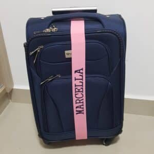 Faixa elástica rosa claro de identificação para mala